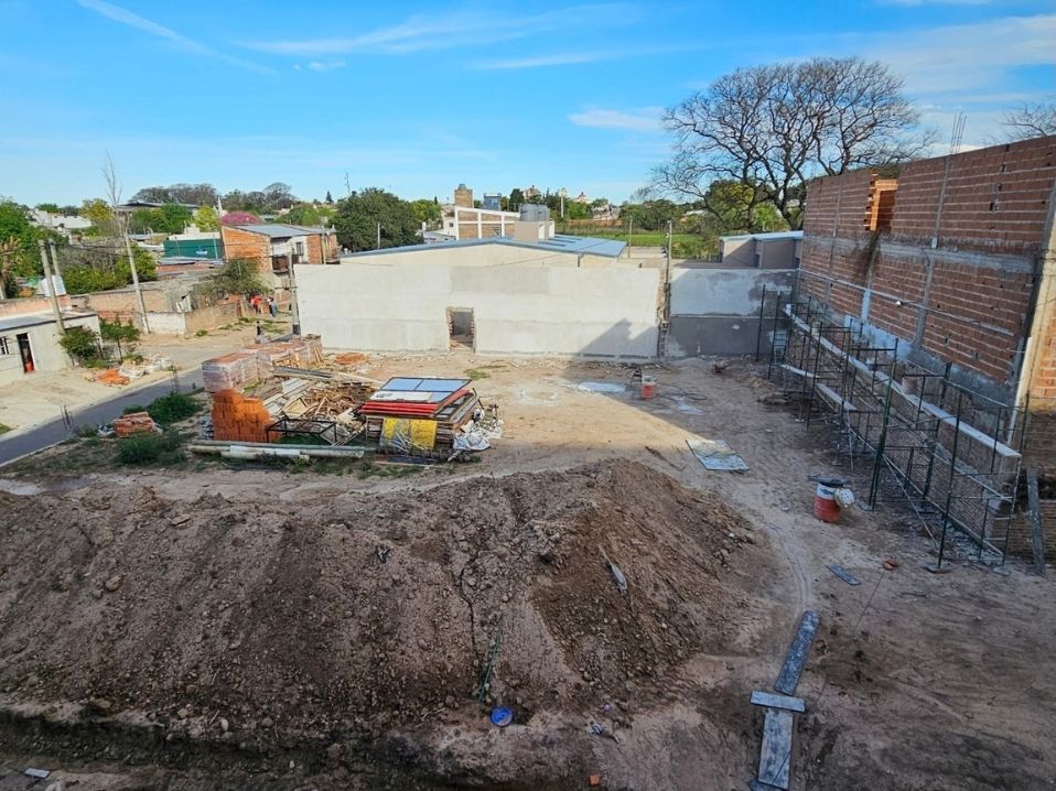 Zona de cocheras y amenities, octubre 2026